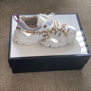 GUCCI
Flashtrek embellished sneakers